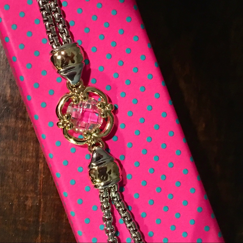 Magnetic clasp rhodium and gold bracelet.